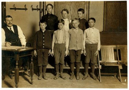 Photo of boys working in Arcade Bowling Alley. Trenton, N.J. Photo taken late at night. The boys work until midnight and later. Dec. 20, 1909. LOC nclc.03369