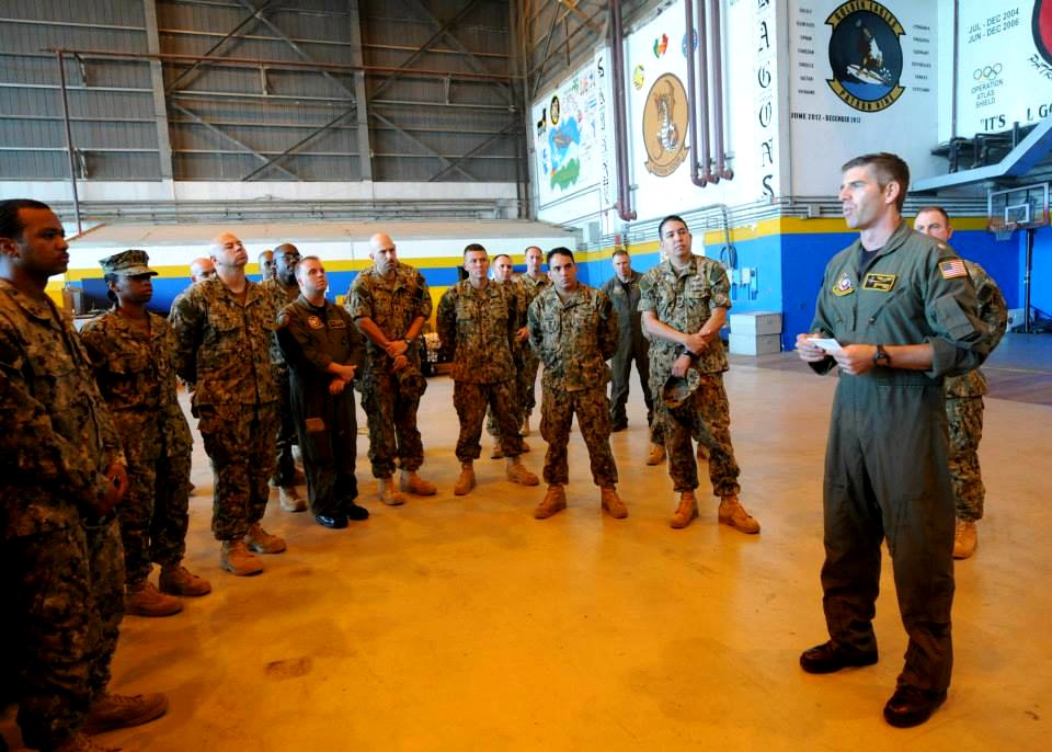 Photo of Patrol Squadron 47 breifing in hanger area