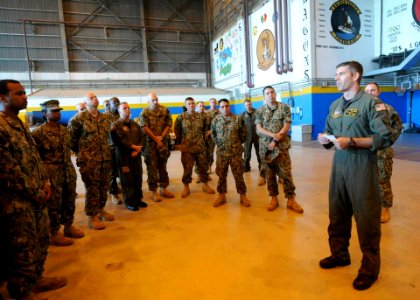 Photo of Patrol Squadron 47 breifing in hanger area