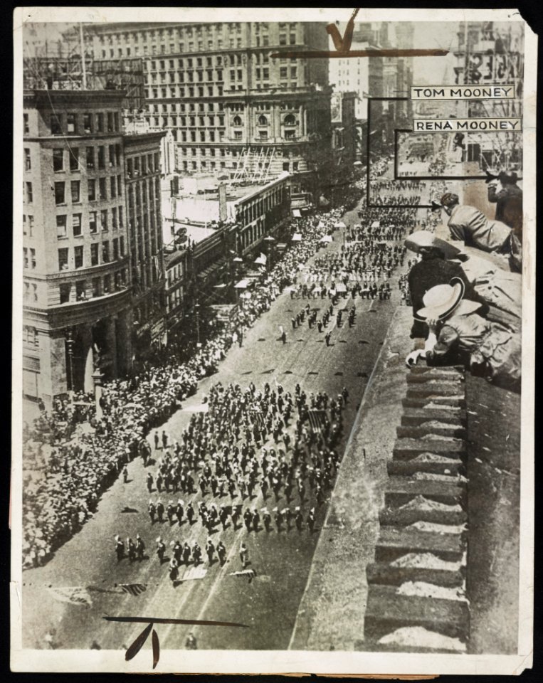 Photo shows general view of the Preparedness Day parade at San Francisco in 1916 looking down Mark Street toward the Ferry Building Tom Mooney and wife are shown in picture on roof top LCCN2016651585