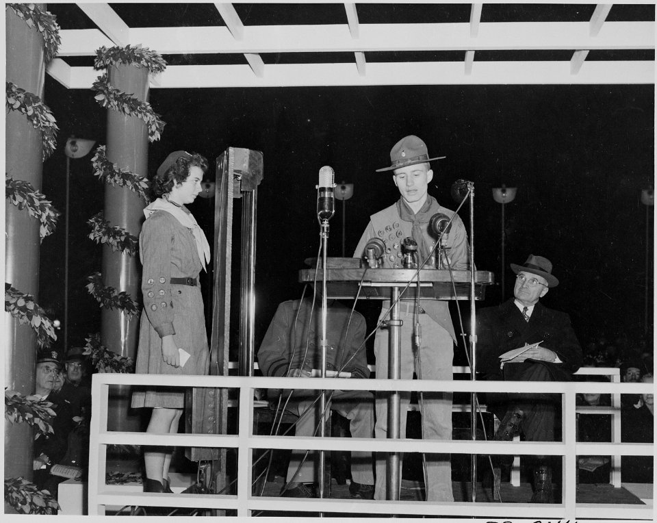 Photograph of a Boy Scout speaking at the ceremonial lighting of the National Community Christmas Tree on the White... - NARA - 199269 photo