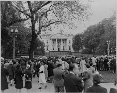 Photograph of a crowd of people in front of the White House, at about the time President Harry S. Truman was sworn... - NARA - 199066