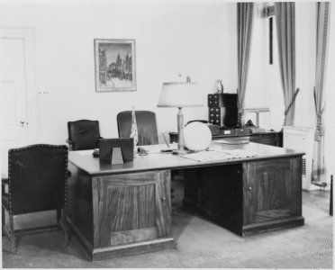 Photograph of a desk in an office at the White House - NARA - 199464