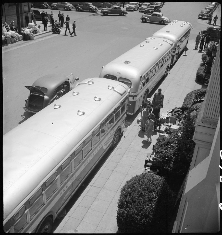 Photograph of Baggage Belonging to Evacuees of Japanese Ancestry Ready to Be Loaded into Moving Vans - NARA - 537703