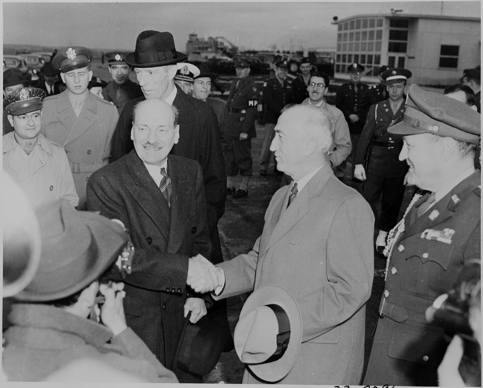 Photograph of British Prime Minister Clement Attlee shaking hands with Secretary of State James Byrnes upon his... - NARA - 199245