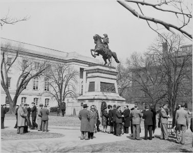 Photograph of ceremony at the statue of Jose de San Martin in Washington, attended by Oscar Ivanissevich, Argentina's... - NARA - 199597 photo