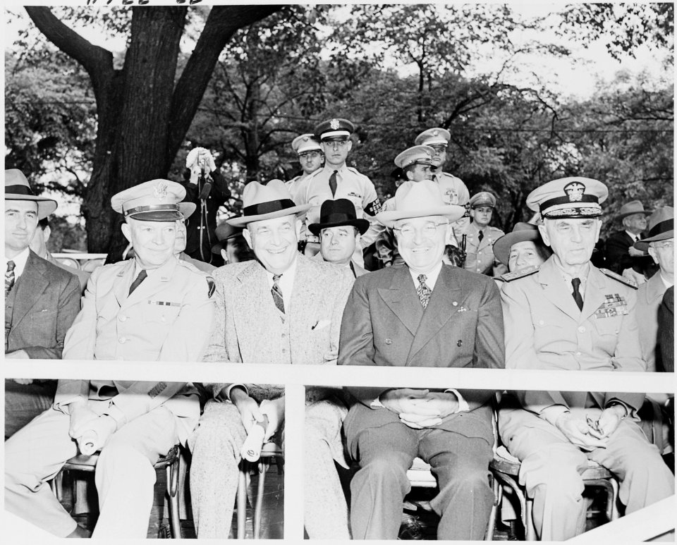 Photograph of dignitaries on the reviewing stand during the Armed Forces Day parade, (left to right) General Dwight... - NARA - 200224
