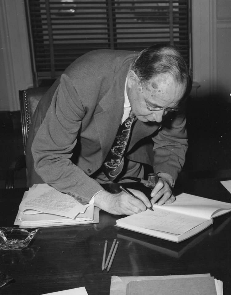 Photograph of Dr. Solon J. Buck Inscribing Copy of Archivium (35438669151)
