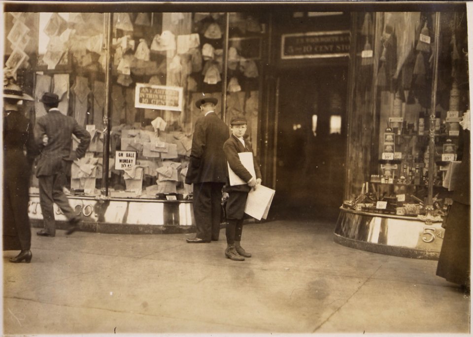 Photograph of Earle Frere, a young truant selling extra during school hours Monday on Pennsylvania Avenue. He said I... - NARA - 306626