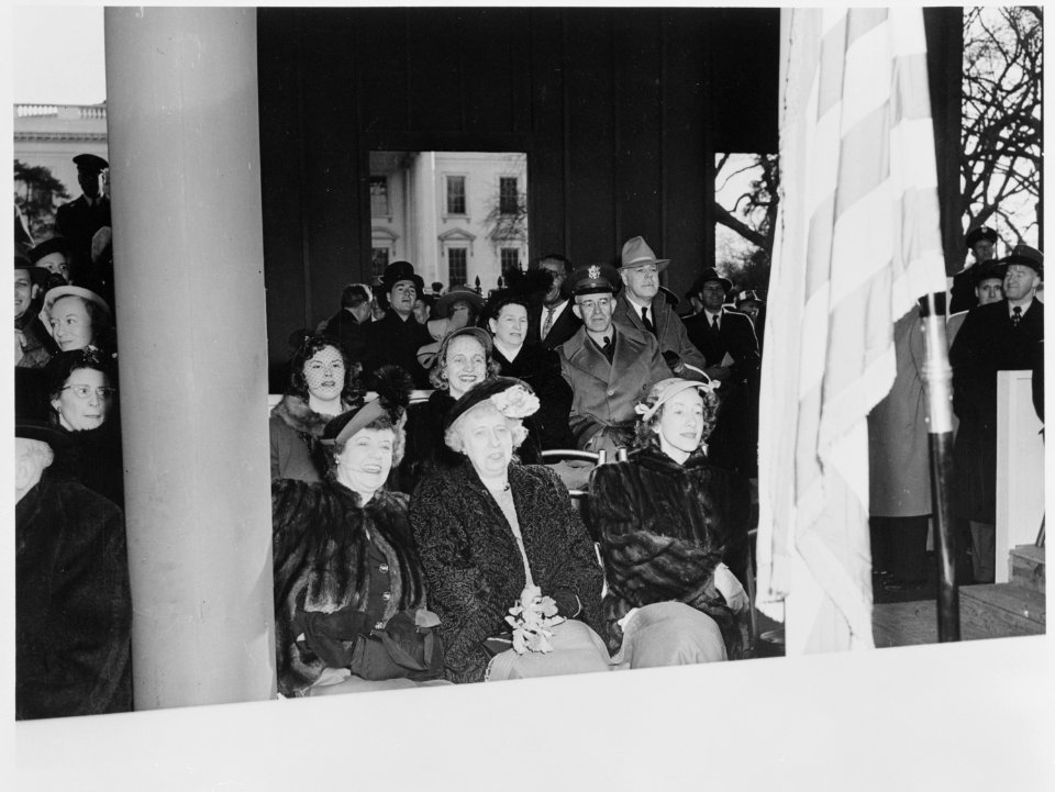 Photograph of First Lady Bess Truman and Margaret Truman, with other dignitaries, watching the Inaugural parade from... - NARA - 200066