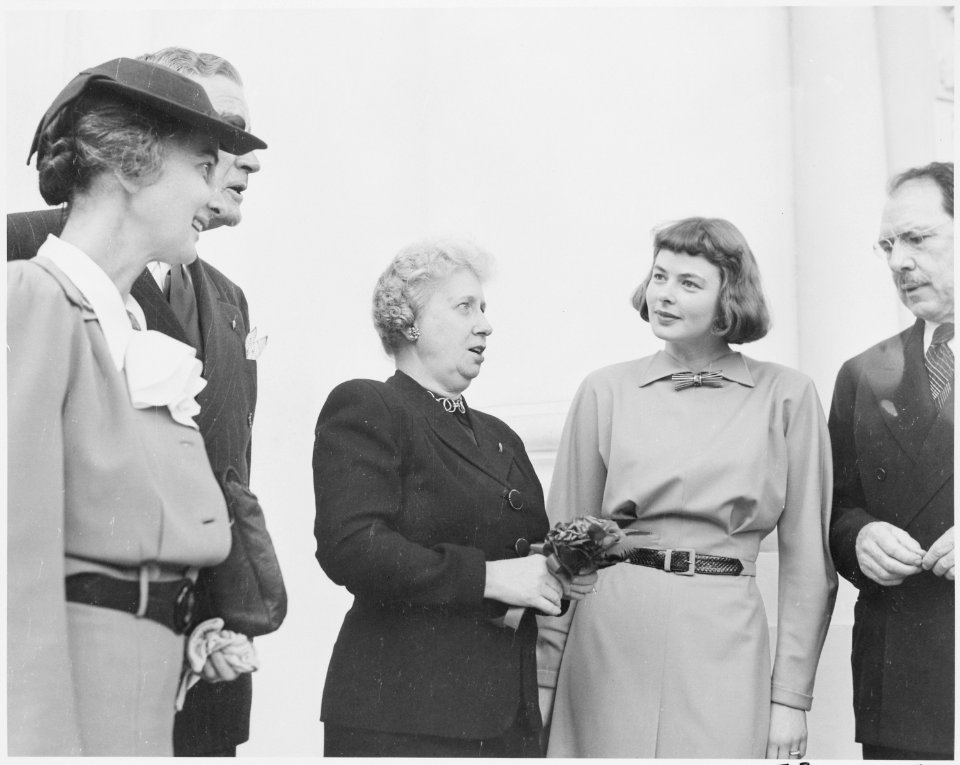 Photograph of First Lady Bess Truman at the White House, receiving a community chest award from actress Ingrid... - NARA - 199442
