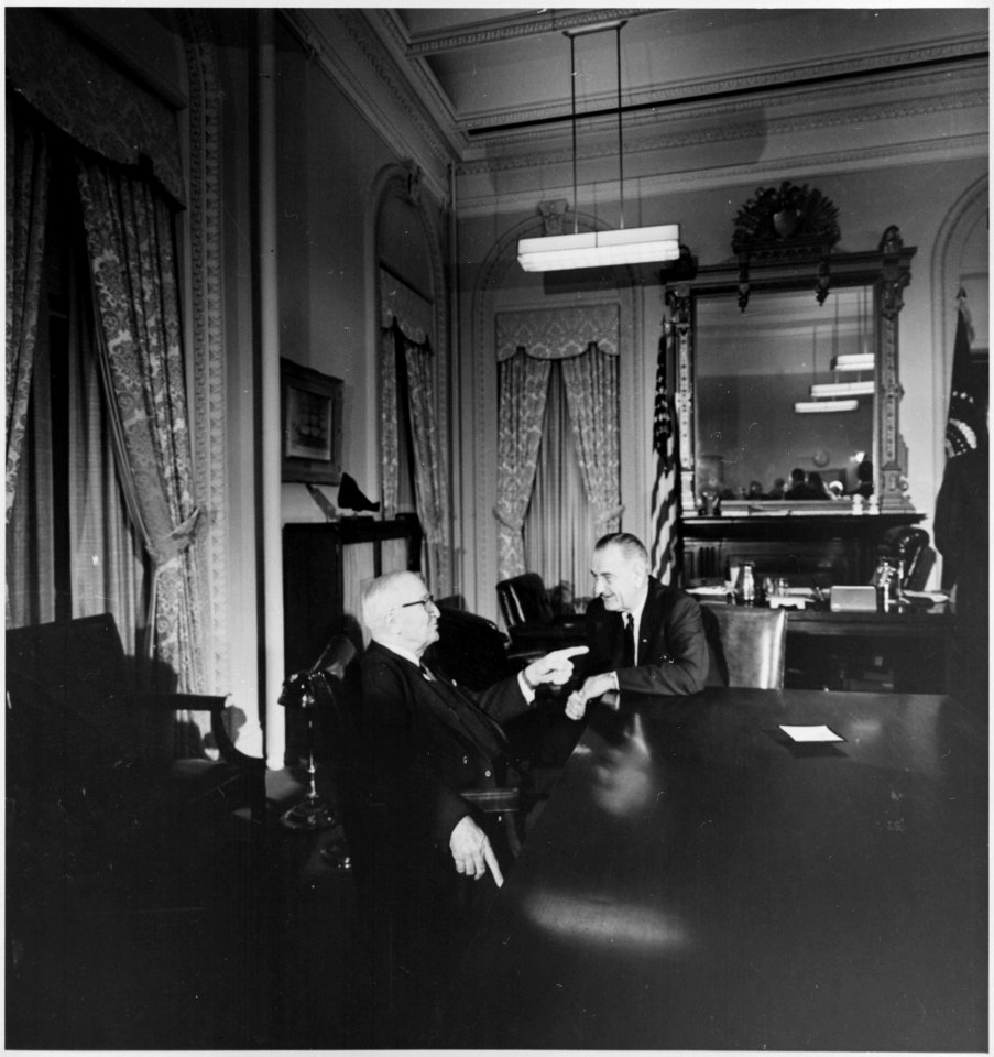 Photograph of former President Harry S. Truman conferring with President Lyndon B. Johnson, presumably at the White... - NARA - 200445
