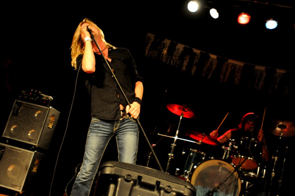 Philadelphia based Alternative rock band Fosterchild lead singer Danny Beissel sings during a New Years Eve concert in Guantanamo DVIDS355356