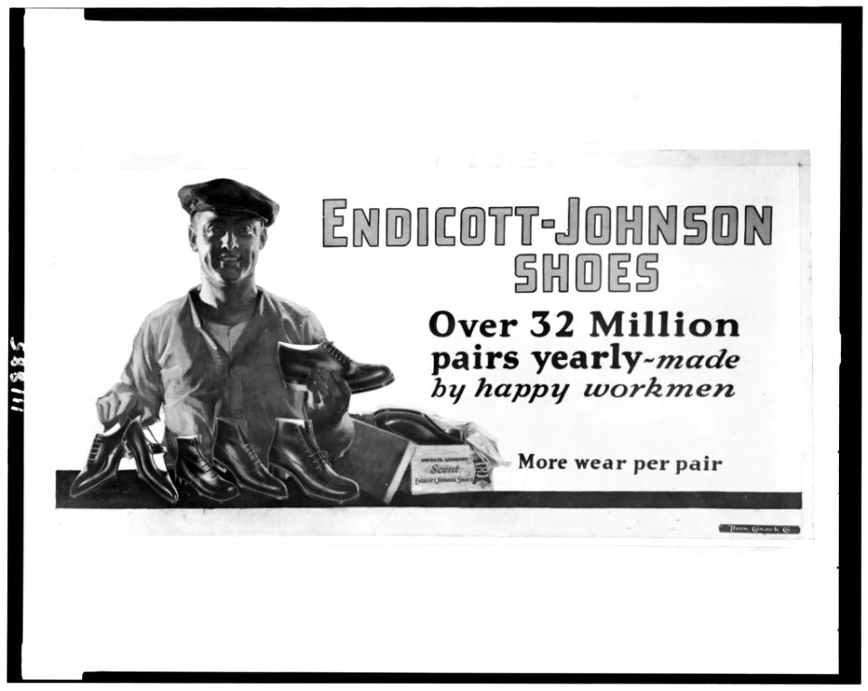 Photograph of billboard advertising Endicott-Johnson shoes, showing man displaying shoes) - Thos. Cosack Co LCCN94512291