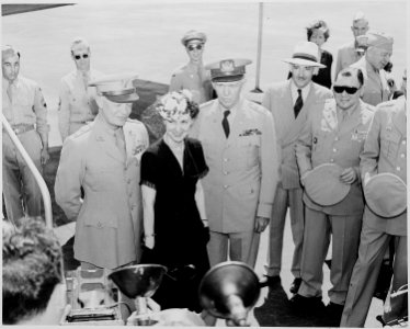 Photograph of General Dwight D. Eisenhower and Mrs. Eisenhower, with the General George C. Marshall and others, at... - NARA - 199107