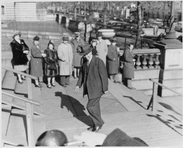 Photograph of George C. Marshall walking in Washington on the day he assumed the office of Secretary of State. - NARA - 199516 photo