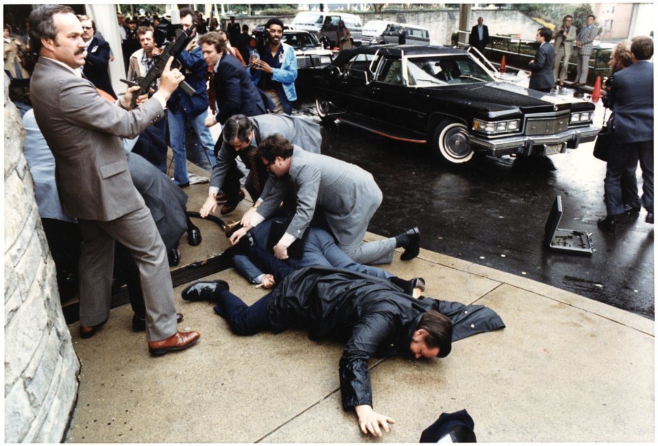 Photograph of chaos outside the Washington Hilton Hotel after the assassination attempt on President Reagan - NARA - 198514