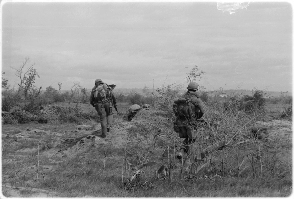 Photograph of Marines Checking a Bunker - NARA - 532458