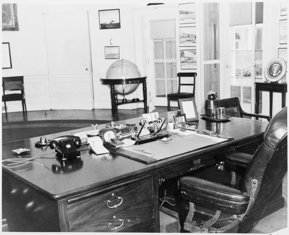 Photograph of objects on President Truman's desk in the Oval Office of the White House. - NARA - 199452
