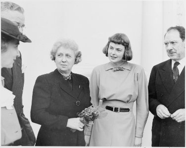 Photograph of First Lady Bess Truman at the White House, receiving a community chest award from a delegation... - NARA - 199440