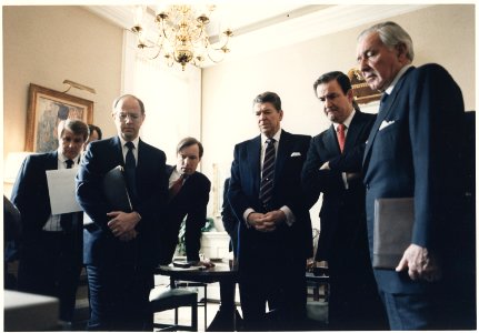 Photograph of President Reagan and his staff watching a televised replay of the Space Shuttle Challenger explosion - NARA - 198572