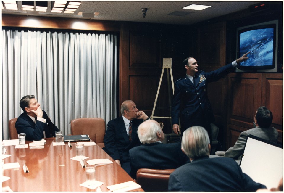 Photograph of President Reagan in a briefing with National Security Council Staff on the Libya Bombing - NARA - 198573