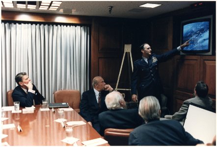Photograph of President Reagan in a briefing with National Security Council Staff on the Libya Bombing - NARA - 198573