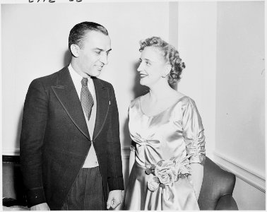 Photograph of Margaret Truman with Howard Mitchell, conductor of the National Symphony Orchestra, on the occasion of... - NARA - 200134