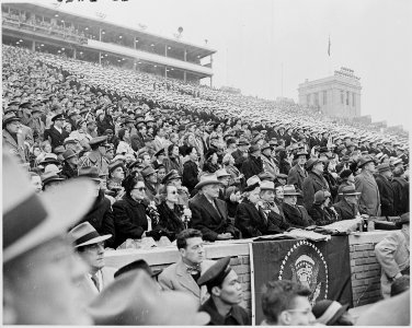 Photograph of President Truman and Mrs. Truman with other dignitaries, watching the Army-Navy football game in... - NARA - 200251