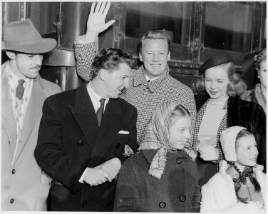 Photograph of movie stars arriving in Washington to participate in Roosevelt Birthday Ball activities, (from left to... - NARA - 199313
