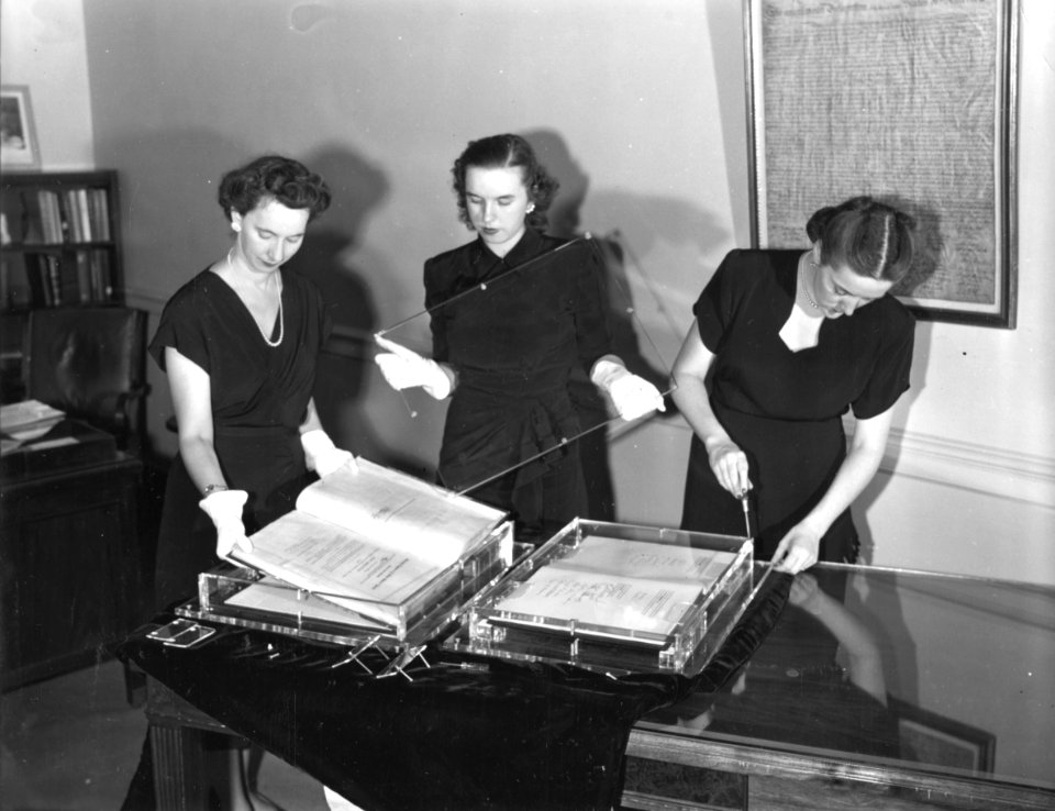 Photograph of Ms. Hamer Installing Display Documents on the Freedom Train (19087844621)