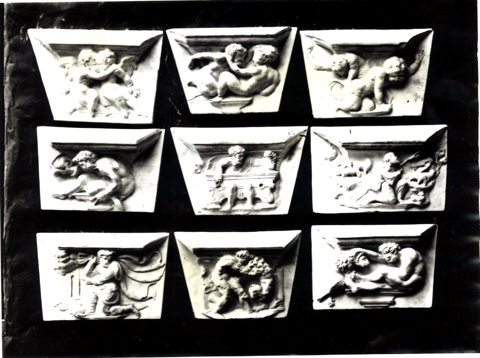 Photograph of nine plaster casts of misericords from the choir stalls of the Grote of Onze-Lieve-Vrouwekerk in Dordrecht Cuypershuis 0687a (036)