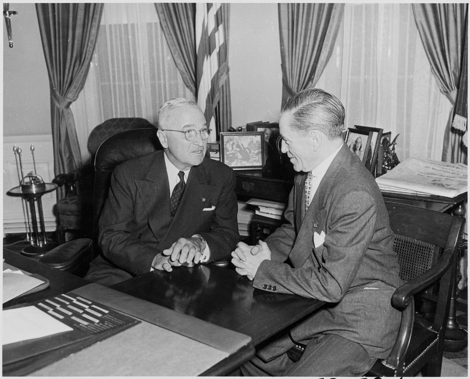 Photograph of President Truman in the Oval Office conferring with Judge James P. McGranery, whom he has nominated to... - NARA - 200370