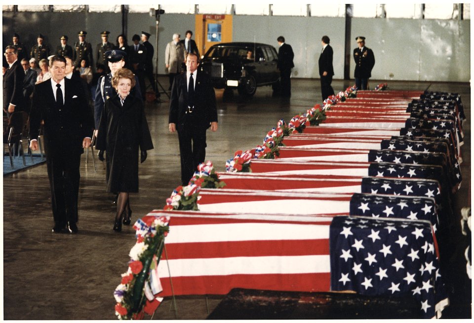 Photograph of President and Mrs. Reagan honoring the victims of the bombing of the U.S. Embassy in Beirut, Lebanon - NARA - 198537
