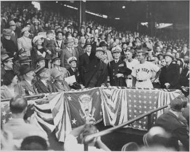 Photograph of President Truman preparing to throw out the first ball of the 1947 baseball season at Washington's... - NARA - 199581