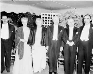 Photograph of President Truman, Mrs. Truman, President Eurico Dutra of Brazil, and other dignitaries, in formal... - NARA - 200126
