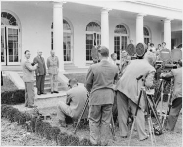 Photograph of President Truman and Field Marshal Bernard Montgomery standing outside the White House, posing for... - NARA - 199430