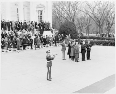 Photograph of President Truman and other dignitaries standing at attention at the Tomb of the Unknown Soldier in... - NARA - 199437