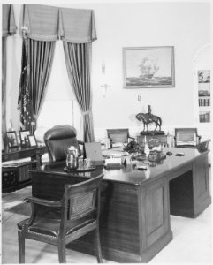 Photograph of President Truman's desk in the Oval Office of the White House. - NARA - 199445 photo