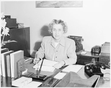 Photograph of President Truman's secretary, Rose Conway, at her desk in the White House. - NARA - 199482