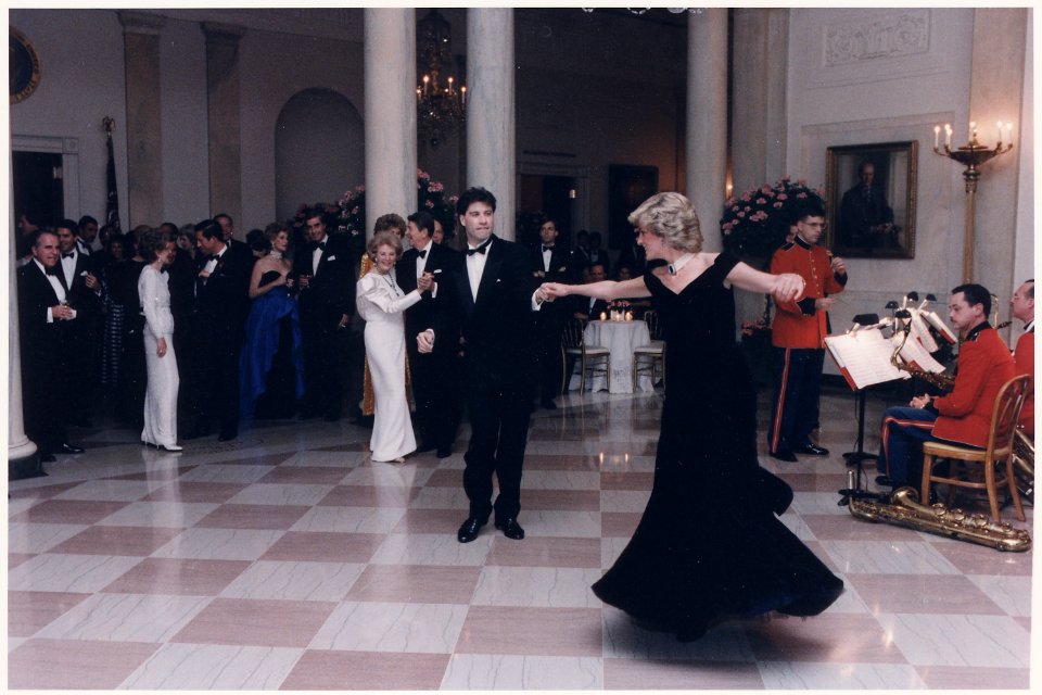 Photograph of Princess Diana dancing with John Travolta at a White House dinner for the Prince and Princess of Wales - NARA - 198569