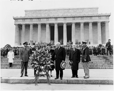 Photograph of the President and Mrs. Truman, and other dignitaries, with a wreath outside the Lincoln Memorial... - NARA - 200181