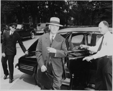 Photograph of Secretary of War Henry Stimson, evidently arriving at the White House for a Cabinet meeting. - NARA - 199142
