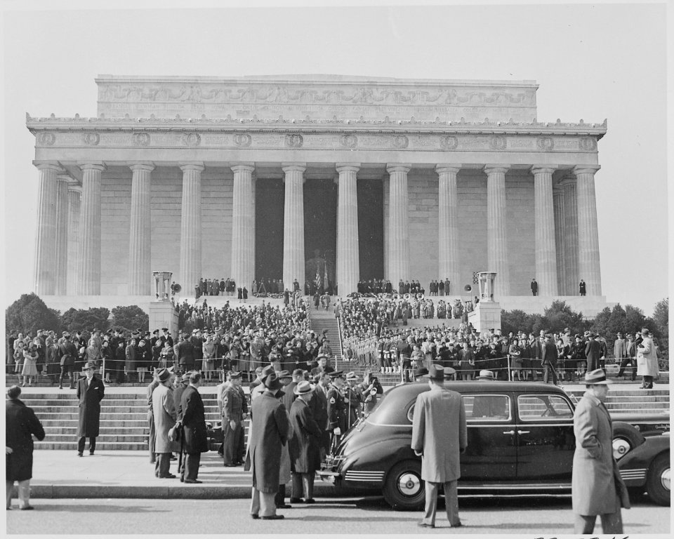 Photograph of the ceremony at the Lincoln Memorial commemorating Lincoln's birthday, with troops and spectators... - NARA - 199501