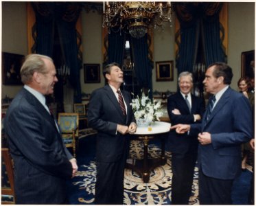 Photograph of the Four Presidents (Reagan, Carter, Ford, Nixon) in the Blue Room prior to leaving for Egypt and... - NARA - 198523