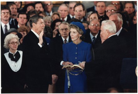 Photograph of President Reagan being sworn in for a second term - NARA - 198559 photo