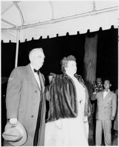 Photograph of Chief Justice Fred Vinson and his wife at Blair House in Washington for a dinner in honor of Winston... - NARA - 200109