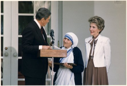 Photograph of The Reagans presenting Mother Teresa with the Medal of Freedom at a White House Ceremony - NARA - 198564