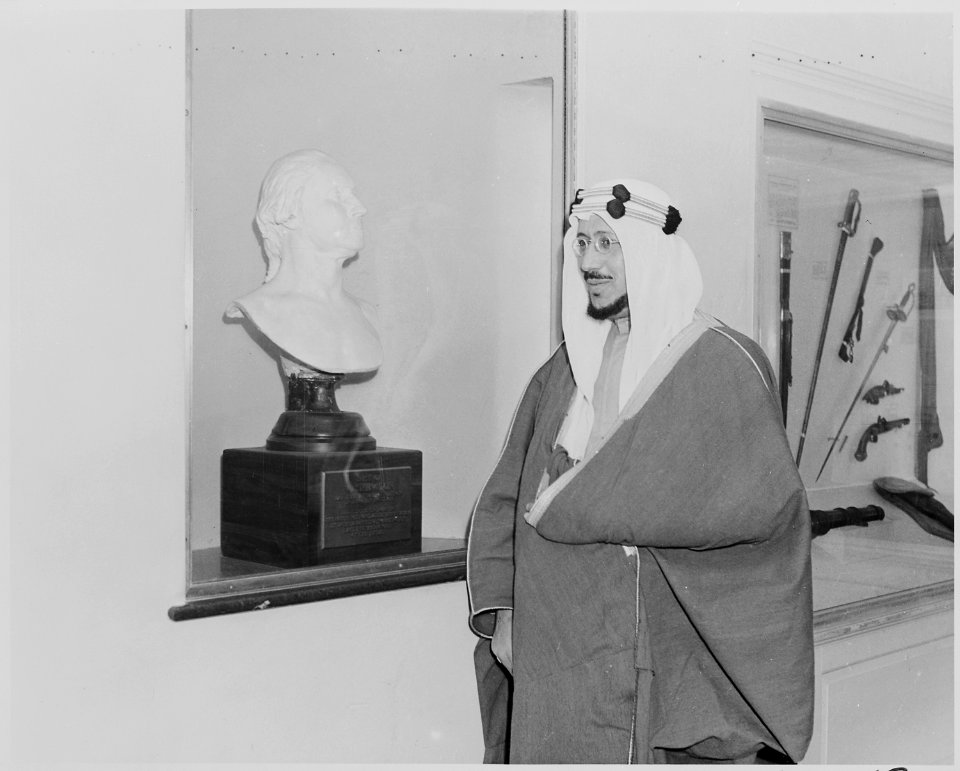 Photograph of Crown Prince Amir Saud of Saudi Arabia, evidently examining exhibits during a visit to George... - NARA - 199524