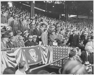 Photograph of President Truman and other officials at Griffith Stadium in Washington for opening day of the baseball... - NARA - 199575